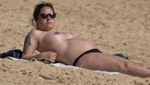 Beautiful busty pregnant topless at the beach 05